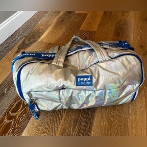 Poppi Iridescent Travel Bag with Blue Accents